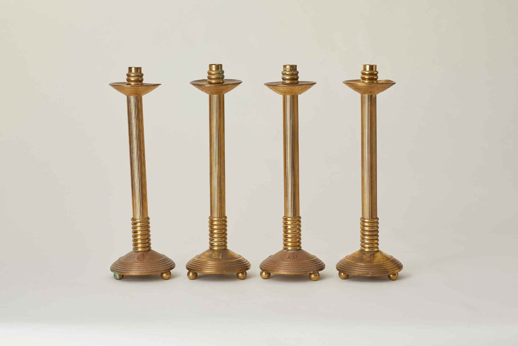 SET OF FOUR VINTAGE BRASS CHURCH CANDLE HOLDERS