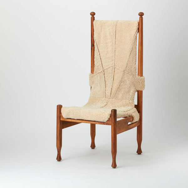 VINTAGE TALL DANISH CHAIR UPHOLSTERED IN VINTAGE SHEEPSKIN