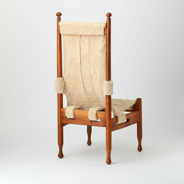 VINTAGE TALL DANISH CHAIR UPHOLSTERED IN VINTAGE SHEEPSKIN